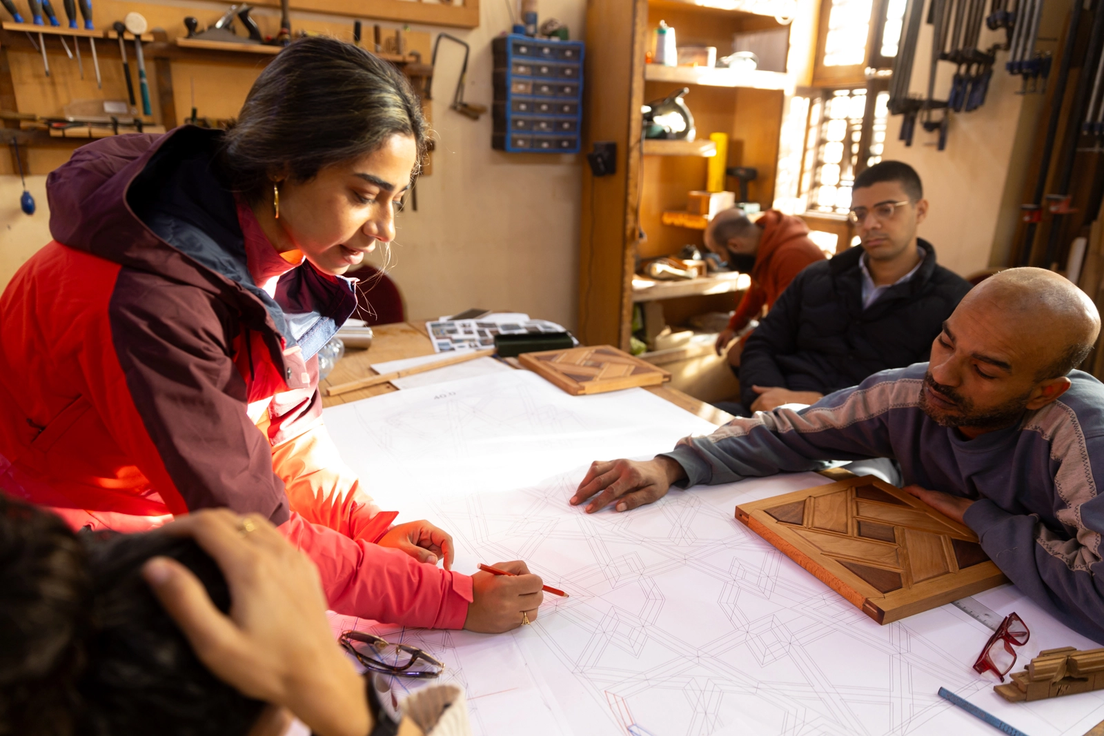 Sacred geometry workshop with traditional compass and ruler techniques